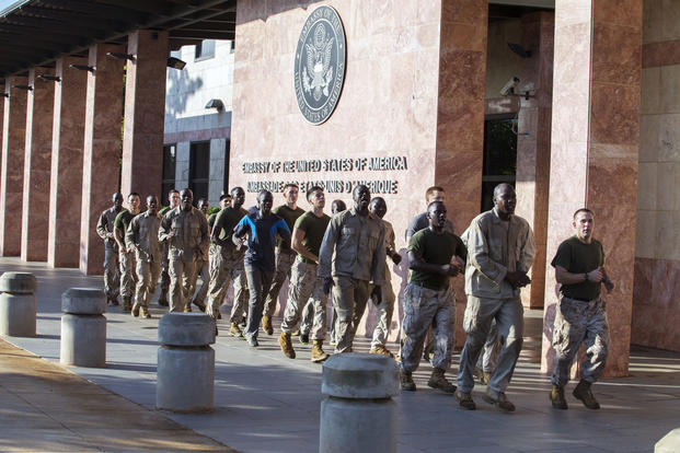 U.S. Marine Corps and other military personnel run during a physical training session outside of the Marine House at the U.S. Embassy, Bamako, Mali, Aug. 29, 2016. (U.S. Marine Corps photo/Staff Sgt. Sarah R. Hickory)