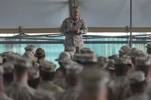 Commandant of the Marine Corps Gen. Robert B. Neller speaks with Marines and Sailors of the Special Purpose Marine Air-Ground Task Force – Crisis Response – Central Command while in the Middle East Dec. 21, 2017. (U.S. Marine Corps/SSgt. Phillip Elgie)
