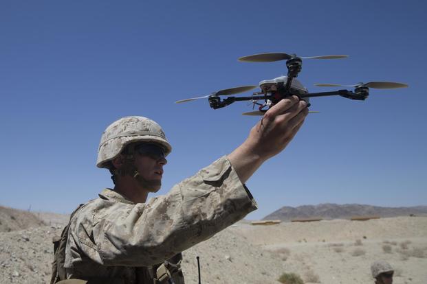 U.S. Marine Corps 2nd Lt. Michael Francica pilots an InstantEye quadcopter during an operations check for Marine Corps Warfighting Laboratory at Marine Corps Air Ground Combat Center, Twentynine Palms, Calif., April. 29, 2018.. (U.S. Marine Corps/Lance Cpl. Scott Jenkins)