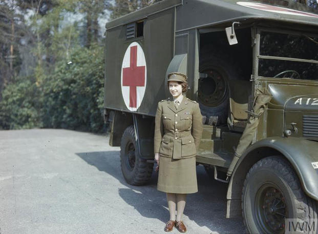 Princess Elizabeth, a 2nd Subaltern in the ATS standing in front of an ambulance. (Imperial War Museum)