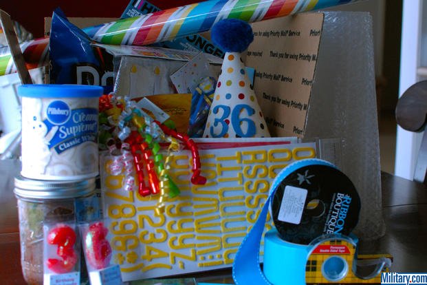 Gather your supplies for your military birthday care package. (Military.com)