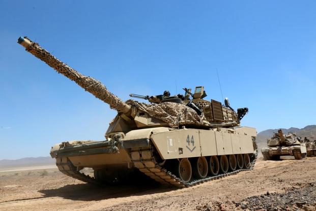 An M1 tank from the 3rd Infantry Division’s 2nd Armored Brigade Combat Team travels in a convoy May 7 at the National Training Center at Fort Irwin, California. Matthew Cox/Military.com