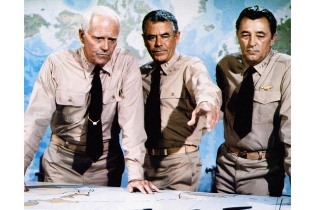 Henry Fonda, Glenn Ford and Robert Mitchum play Old Men Pointing at Maps as they prepare to send young men into battle in "Midway." (Universal)