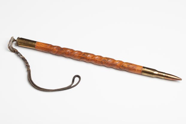 This swagger stick was made for an American by the German POWs he supervised. (National World War II Museum) Swagger Stick Trench Art
