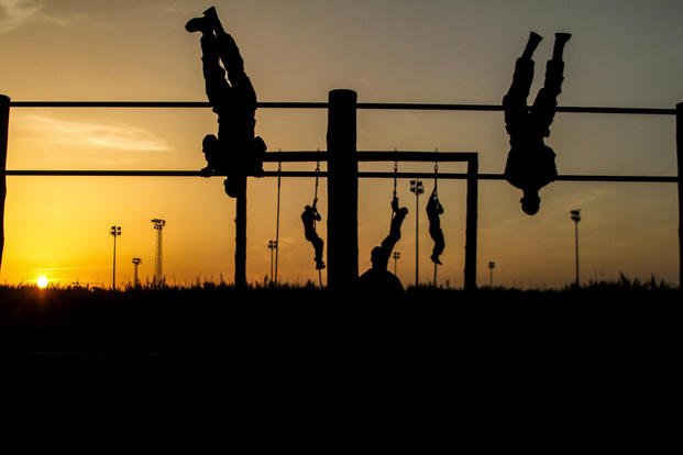 Marines work out at sunset.