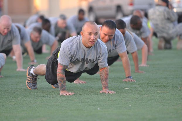 A sergeant performs a push-up during physical training.