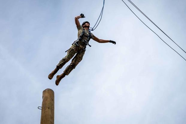 Cadets at the U.S. Air Force Academy in Colorado navigate an obstacle course.
