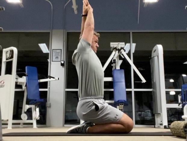 (Stew Smith) stew smith ankle stretch pose
