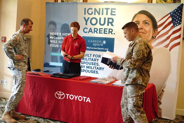 Soldiers learn about job opportunities from Toyota, which was one of several international companies that brought representatives to the Hawaii Transition Summit, Oct. 18, 2016. (Christine Cabalo/U.S. Army photo)
