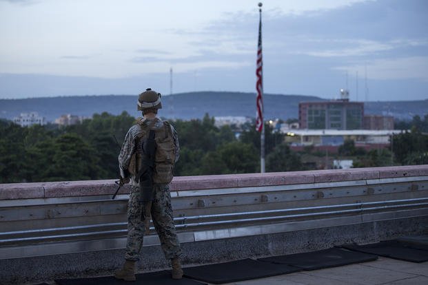 A U.S. Marine Security Guard (MSG) watch stander provides security while standing post on the roof of the U.S. Embassy, Bamako, Mali.