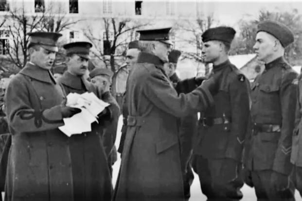 Army Gen. John Pershing pins the Medal of Honor on recipient Pfc. Charles Barger during a ceremony for several soldiers at his headquarters in Chaumont, France, in February 1919. (Photo courtesy of Joseph Grokett) Army Gen. John Pershing pins the Medal of Honor on recipient Pfc. Charles Barger during a ceremony for several soldiers at his headquarters in Chaumont, France, in February 1919.
