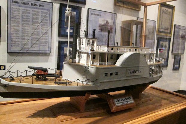 This May 2, 2012, photo, shows a model of the CSS Planter at the Charleston Museum in Charleston, S.C. The display is part of a traveling exhibit entitled ‘The Life and Times of Congressman Robert Smalls.’ (Bruce Smith/AP Photo) This May 2, 2012, photo, shows a model of the CSS Planter at the Charleston Museum in Charleston, S.C. The display is part of a traveling exhibit entitled ‘The Life and Times of Congressman Robert Smalls.’
