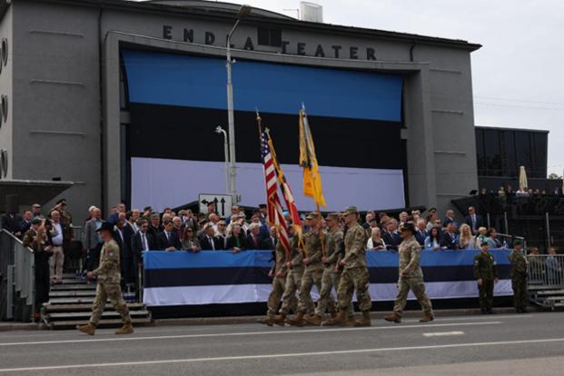 U.S. Army Lt. Col. Jonathan Roland, commander of the 5th Squadron, 7th Cavalry Regiment, 1st Armored Brigade Combat Team, 3rd Infantry Division, Command Sgt. Maj. Jose Padilla, the squadron senior enlisted advisor, and a combined color guard of squadron personnel and the Maryland National Guard Soldiers conduct a Pass in Review during the Victory Day ceremony in Pärnu, Estonia, June 23, 2025. Estonian Victory Day commemorates the 1919 Battle of Võnnu, when Estonian forces defeated Baltic-German troops during the War of Independence, a pivotal moment in Estonia’s fight for sovereignty. Serving under Task Force Iron, the 5th Squadron, 7th Cavalry Regiment is deployed to Europe to conduct multinational training alongside NATO allies and regional partners, supporting V Corps’ mission to provide combat-credible forces across the continent. (U.S. Army photo by 1st Lt. Daniel Luong).
