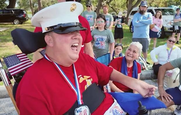 Marine Corps veteran Jose Pequeno after receiving his new dress blues. (Photo courtesy of Fox 13 Tampa)