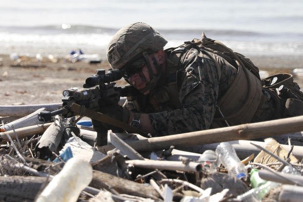 Marine Corporal Robert Maurer with 3/25, provides security during multi-domain training in Trinidad and Tobago during TRADEWINDS 2025 (U.S. Army National Guard photo by Spc. Astia LeBron)