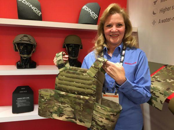 Lori Wagner of Honeywell displays an armored plate carrier made with the new Centurion fabric. Photo by Hope Hodge Seck