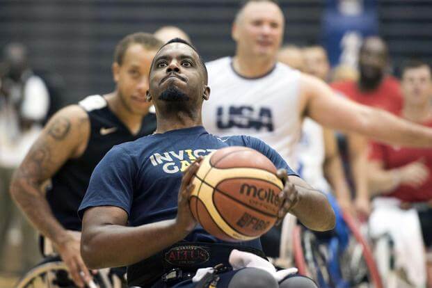 Army veteran RJ Anderson sinks a free throw at Hofstra University on Long Island, N.Y., Sept. 19, 2017, as the U.S. wheelchair basketball team trains for the 2017 Invictus Games. (DoD photo by Roger L. Wollenberg)