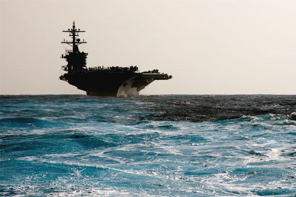 The Navy aircraft carrier USS Carl Vinson transits the Pacific Ocean on Jan. 18. As it approaches the Korean peninsula, North Korea has threatened to sink it as a demonstration of its "military prowess." (US Navy photo/Nathan Serpico)