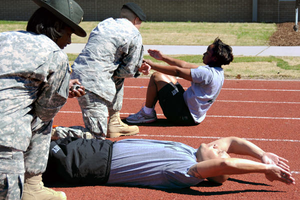 Army PT on a track.