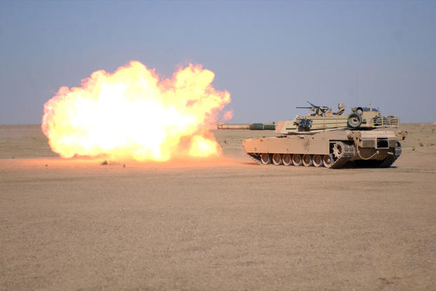 An M1A1 Abrams fires its main gun. (Photo: U.S. Army)