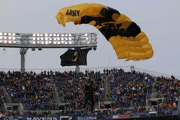 The Army Golden Knights and the Navy Leap Frogs parachuted into the stadium before the game. (Military.com/Steve Whitman)
