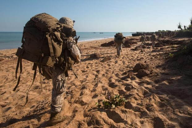 Marines begin to patrol inland to secure secondary objectives following an July 11 amphibious assault training exercise at Fog Bay, Australia. Marines.mil.
