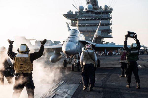 Caption: An F/A-18C Hornet is ready to launch from the deck of the USS Harry S. Truman in the Arabian Gulf, Feb. 3, 2016, on a mission in support of Operation Inherent Resolve. (US Navy photo)