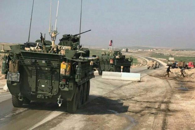 Photos of Strykers and up-armored Humvees flying U.S. flags were posted on social media over the weekend after the U.S. regional command confirmed that Special Forces troops in Syria had moved toward Manbij. (Qalaat Al Mudiq/Twitter)