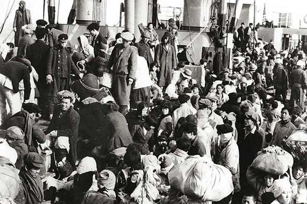 Korean refugees on the main deck of the SS Meredith Victory (Photo: US Navy)
