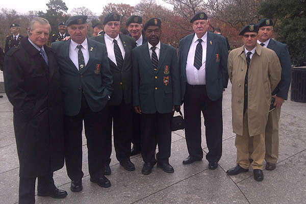 Mohler poses with Special Forces Association members at Arlington National Cemetery in 2011. His SFA application claimed he served with Special Forces. The "rescinded" order for his Distinguished Service Cross stated he served with 75th Infantry (Ranger).