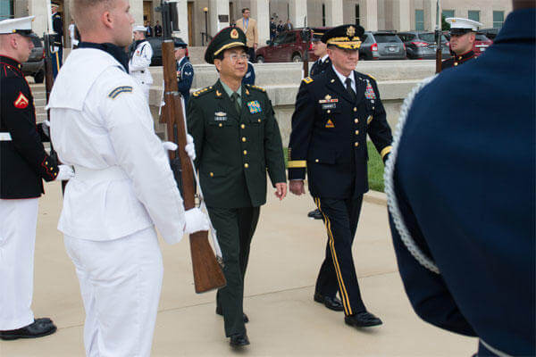 U.S. Army Gen. Martin E. Dempsey, right, chairman of the Joint Chiefs of Staff, and Chinese Army Gen. Fang Fenghui, chief of the general staff, walk together during a full-honor arrival ceremony at the Pentagon, May 15, 2014DOD photo by D. Myles Cullen