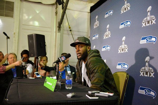 Kam Chancellor, a defensive back for the National Football League’s defending champion Seattle Seahawks, talks to members of the media during Super Bowl Week in Glendale, Ariz., Jan. 26, 2015. DoD photo by Army Sgt. 1st Class Tyrone C. Marshall Jr.
