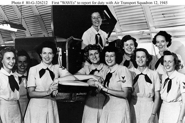 A file photograph dated July 24, 1945 shows the first group of WAVES to report for duty with VR-12 at Naval Air Station, Quonset Point, R.I. (U.S. Navy photo/Released)