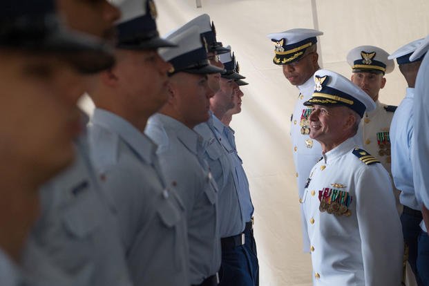 Cmdr. Arthur Ray relieved Cmdr. Terry Johns as commanding officer of the Coast Guard Cutter Vigorous during a change of command ceremony at Joint Expeditionary Base Little Creek-Fort Story. (U.S. Coast Guard photo by Petty Officer 2nd Class Walter Shinn)