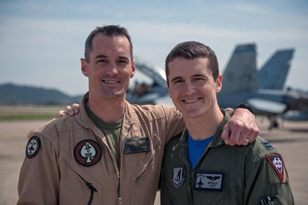 Marine Corps Capt. Jarrod Allen, an F/A-18 Hornet pilot with Marine Fighter Attack Squadron 225, and Air Force Capt. Jacob Allen, an F-16 Fighting Falcon pilot with the 35th Fighter Squadron, April 17, 2015. U.S. Air Force photo/Senior Airman Taylor Curry