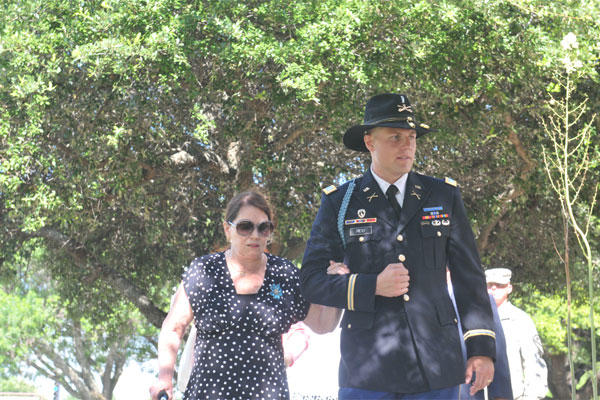 Susan Rescorla, wife of Col. (Ret.) Cyril Richard “Rick” Rescorla and 1st Lt. Ross Reid , a Cardiff, Wales, native, walk toward the ceremony dedicated to Rescorla June 11 at Fort Hood, Texas. (U.S. Army photo by Sgt. Brandon Banzhaf)