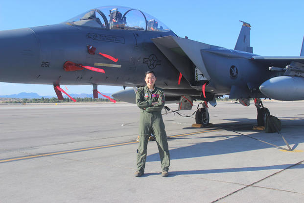 Capt. Kari Armstrong, an F-15E Strike Eagle weapon systems officer with the 389th Fighter Squadron, received a diploma from the U.S. Air Force Weapons School at Nellis Air Force Base, June 27, 2015. (U.S. Air Force/Courtesy photo/Susan Garcia)
