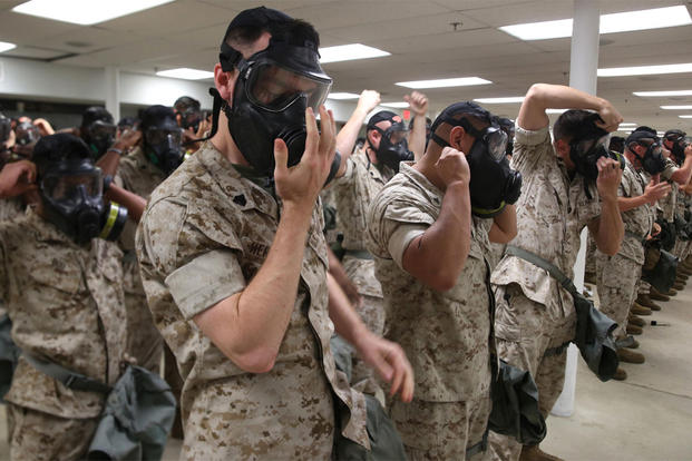Marines and Sailors with Chemical Biological Incident Response Force unit participated in an all hands on gas mask drill on June 7. 2016. at the Naval Support Facility Indian Head, Md. (Photo: Staff Sgt. Santiago G. Colon Jr.)