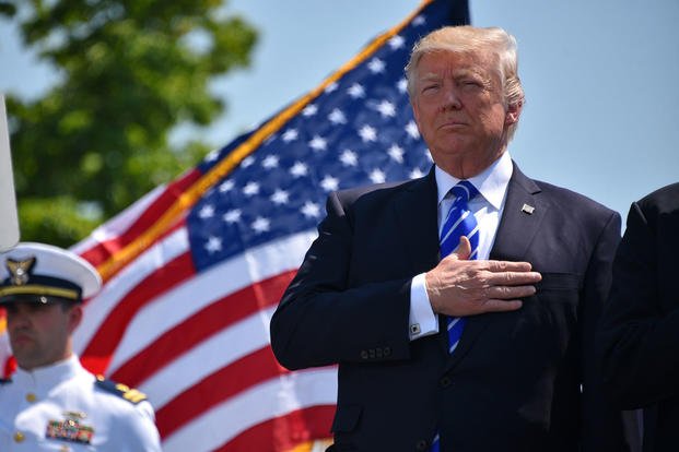 President Donald Trump renders honors during the 136th Coast Guard Academy commencement exercise in New London, Conn., May 17, 2017. (Coast Guard photo/Petty Officer 2nd Class Patrick Kelley)