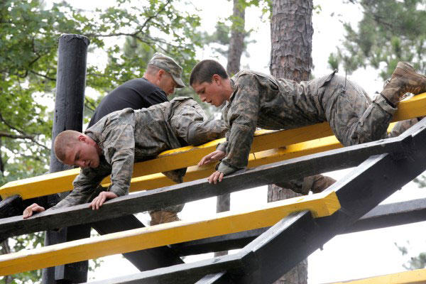 U.S. Army soldiers participate in the Darby Queen obstacle course as part of their training at the Ranger School at Ft. Benning Ga., June 28, 2015. Army Photo.