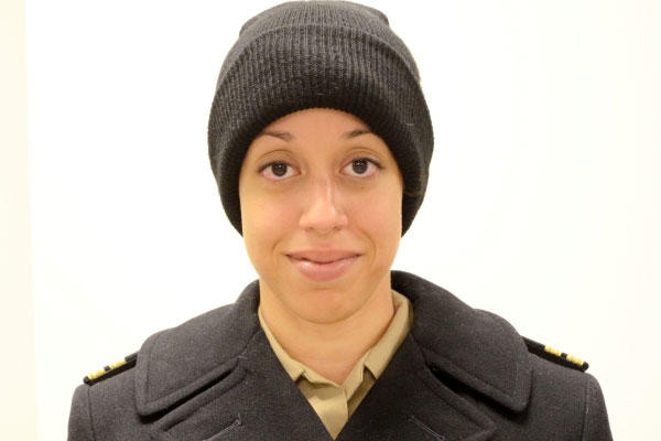 Lt. Jessica Crownover wears the Navy watch cap with reefer jacket with her service uniform. (US Navy Photo)