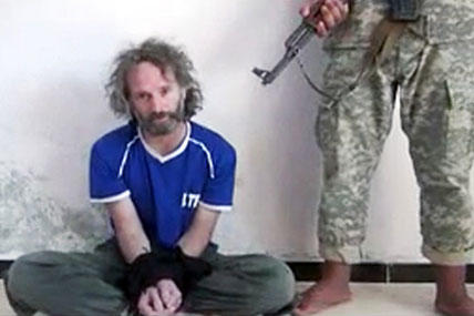 This image made from undated video obtained by The Associated Press, which has been authenticated based on its contents and other AP reporting, shows a man believed to be Peter Theo Curtis, a U.S. citizen held hostage by an al-Qaida linked group in Syria.
