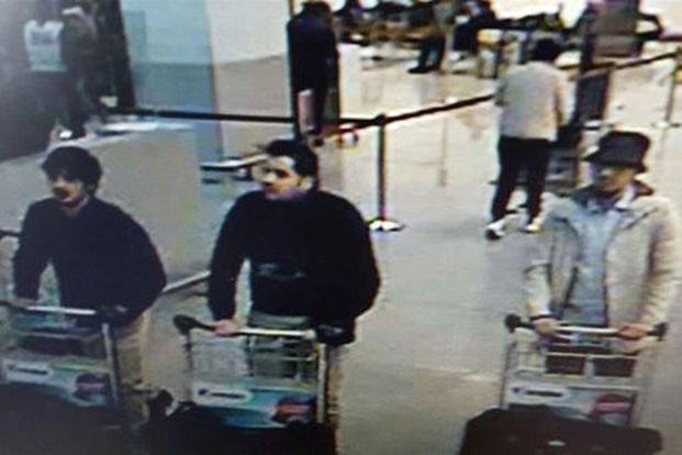 In this handout provided by the Belgian Federal Police, a screengrab of the airport CCTV camera shows suspects from the attacks at Brussels Airport pushing a trolley with suitcases, on March 22, 2016.