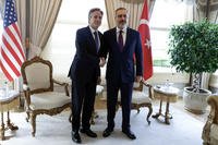 U.S. Secretary of State Antony Blinken shakes hands with Turkish Foreign Minister Hakan Fidan