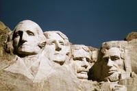 The images of, from left, former presidents George Washington, Thomas Jefferson, Theodore Roosevelt and Abraham Lincoln are shown on Mount Rushmore in South Dakota.