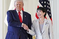 President Donald Trump, left, and Japanese Prime Minister Sanae Takaichi shake hands before their summit talk at Akasaka Palace in Tokyo, Tuesday, Oct. 28, 2025. (Kyodo News via AP) Japan Trump Asia