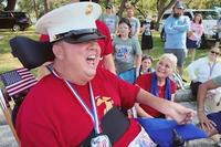 Marine Corps veteran Jose Pequeno after receiving his new dress blues. (Photo courtesy of Fox 13 Tampa)