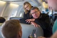 Defense Secretary Ash Carter answers a reporter's question during a flight to California, Nov. 14, 2016. (DoD photo by Army Sgt. Amber I. Smith)