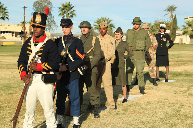 Marines showcase Marine Corps uniforms spanning different time periods. (Photo: U.S. Marine Corps/Lance Cpl. Torrey L. Gray Field)