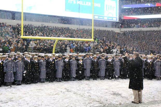 Midshipmen and Cadets stand for the invocation before kickoff of the 118th Army-Navy Game. (Photo by Steve Whitman for Military.com)